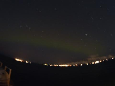 faint northern lights in reykjavik