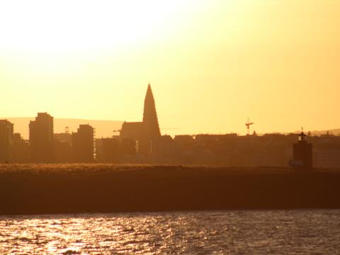 hallgrimskirkja as seen from the sea at sundown