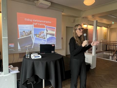 rannveig making a speech for staff orientation