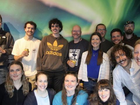 Naturalists pose for a group photo at the Aurora Reykjavík exhibition!