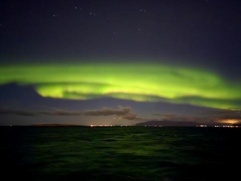 northern lights over the sea