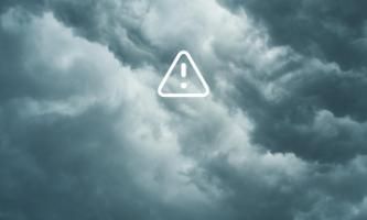 Dark clouds with exclamation point.