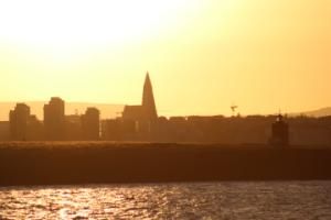 hallgrimskirkja as seen from the sea at sundown