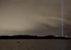 humpback whale and imagine peace tower on northern lights cruise