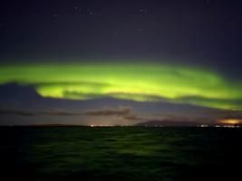 northern lights over the sea