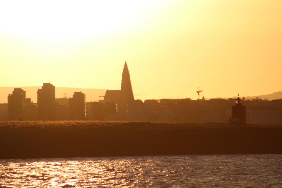 hallgrimskirkja as seen from the sea at sundown