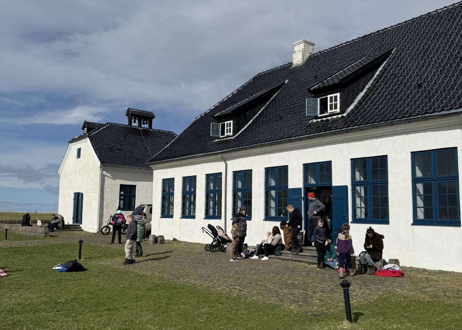 people in front of viðeyjarstofa café