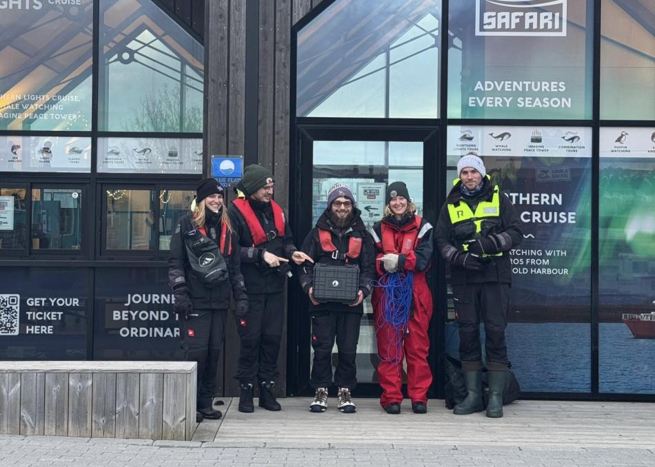 elding research team holding a hydrophone