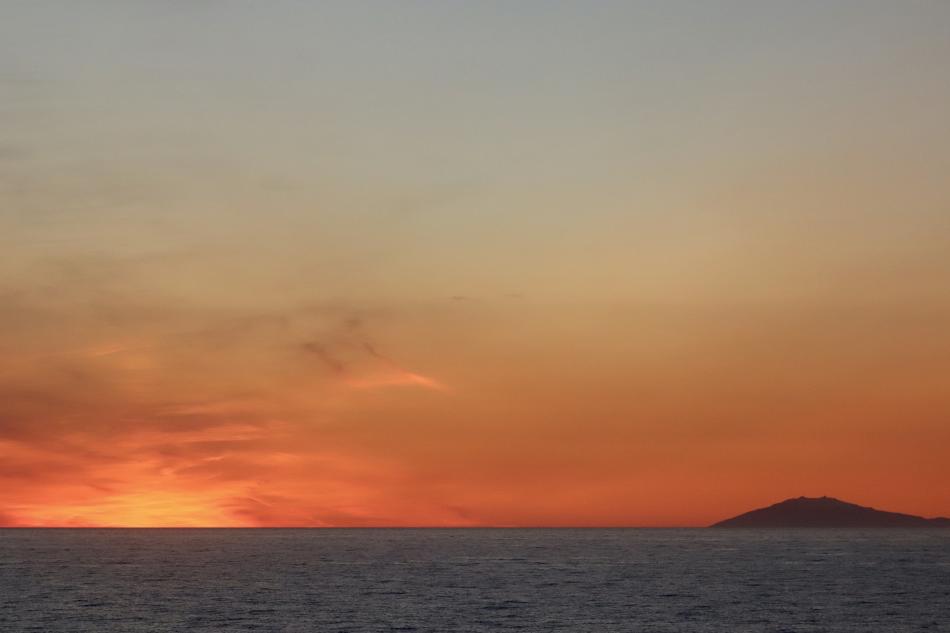 lad summer midnight sun sunset in iceland with snæfellsjökull in the background