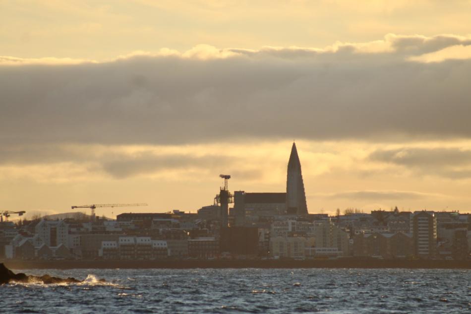 Hallgrímskirkja church seen from sea during sunset