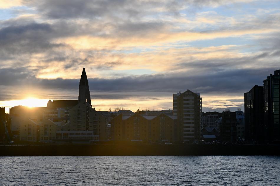Hallgrímskirkja church seen from sea during sunset