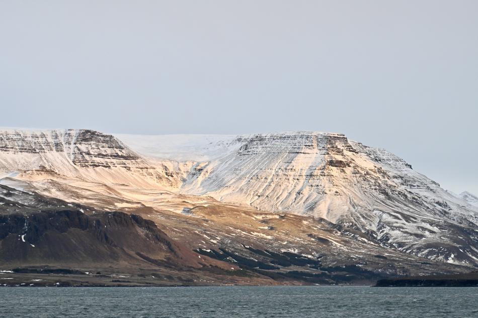 mt Esja during winter, half covered in snow
