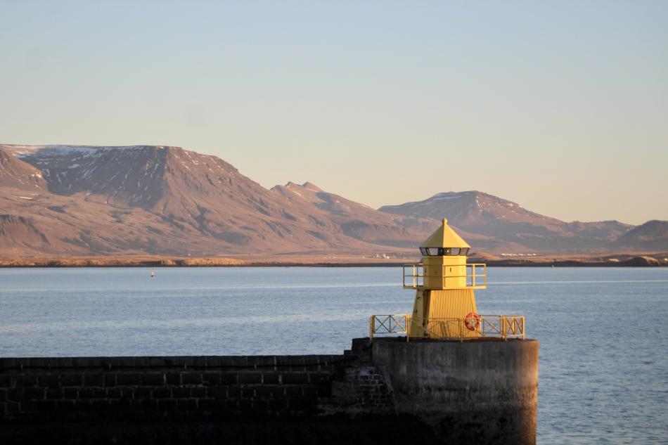 lighthouse with mt. Esja in the background